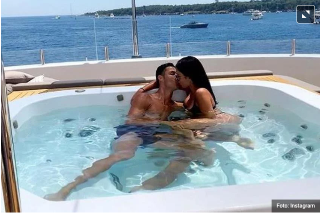 Enjoying the Jacuzzi: Graceful Georgina in a striking embrace with Ronaldo